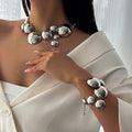 Damen Schmuckset mit skulpturalen Edelstahl-Elementen Shop Nory