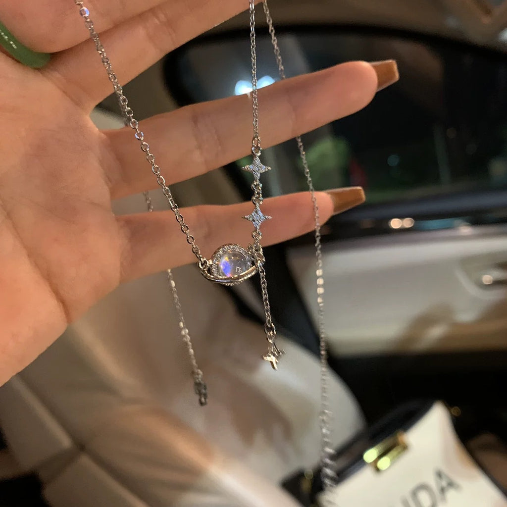 Damen Halskette mit planetarischem Anhänger und funkelnden Zirkonia Shop Nory