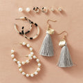 Damen Schmuckset mit verschiedenen Ohrsteckern und langen Quastenohrringen Shop Nory