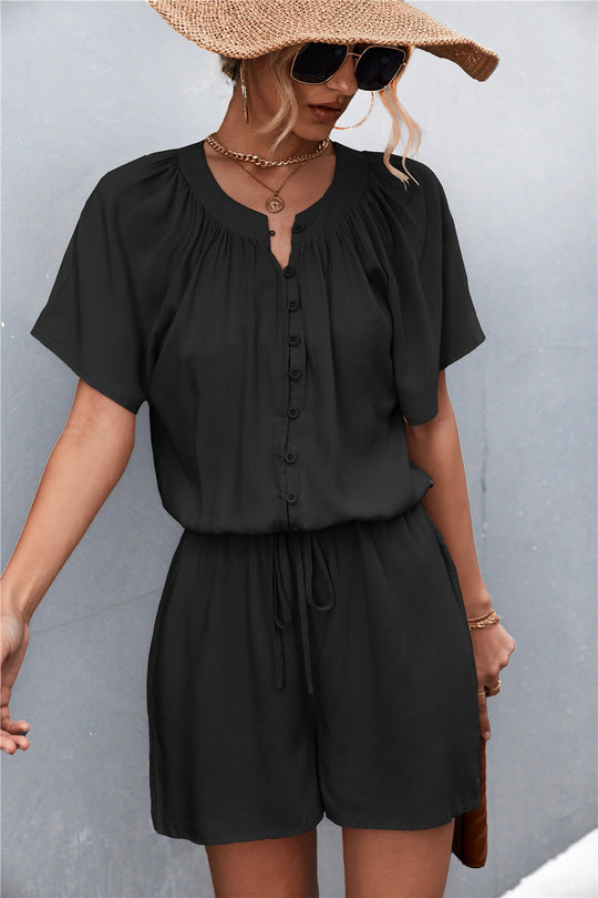 Damen Jumpsuit mit elastischem Bund und knopfverzierter Front