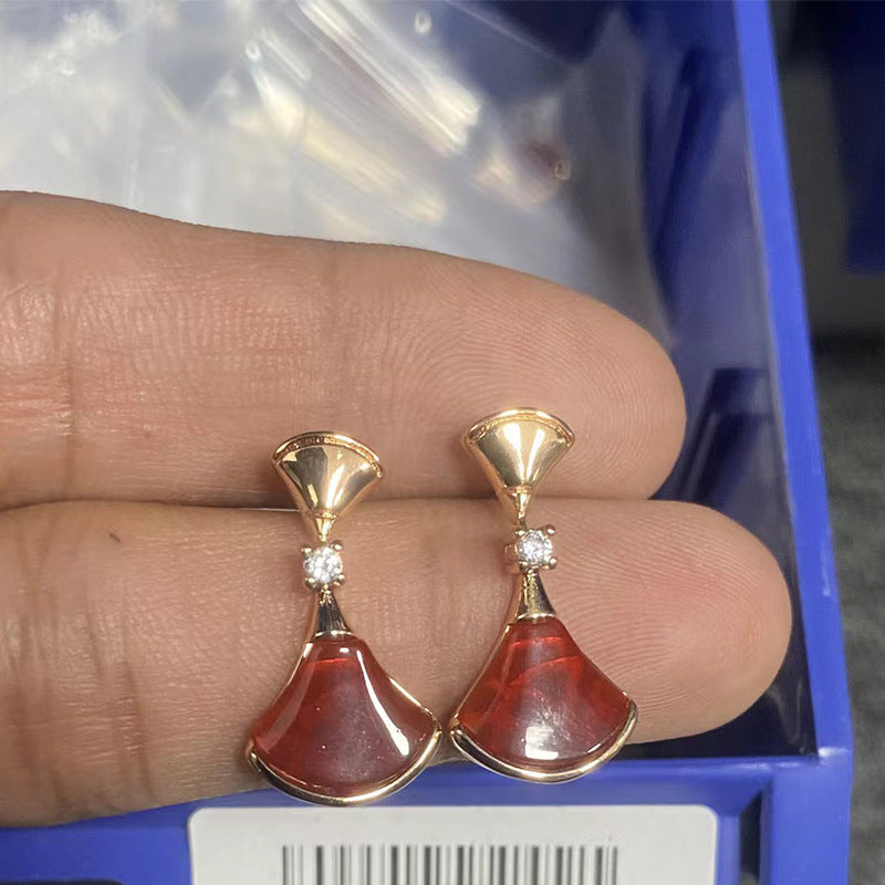 Damen Ohrringe mit kunstvollem Perlmutt-Design und funkelnden Zirkonia Shop Nory