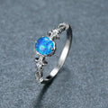 Damen Schmuckring mit opalisiertem Stein und filigranem Design Shop Nory