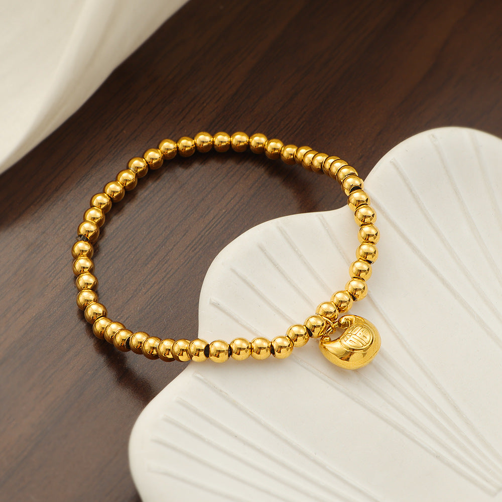 Damen elegantes Armband mit feinen Perlen und charmantem Anhänger Shop Nory