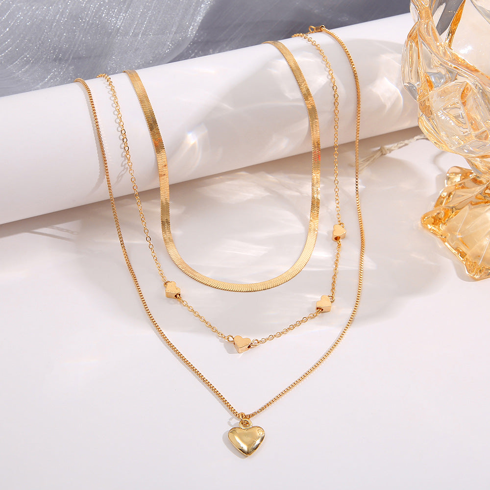 Damen Halsketten-Set mit zarten Herzanhängern und eleganten Gliederketten Shop Nory