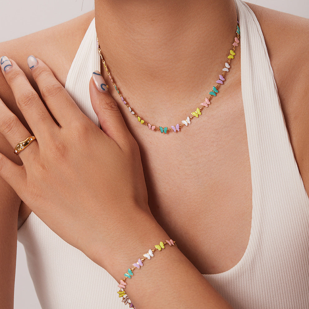 Damen Armband mit bunten Schmetterlingen und hypoallergenem Edelstahl Shop Nory