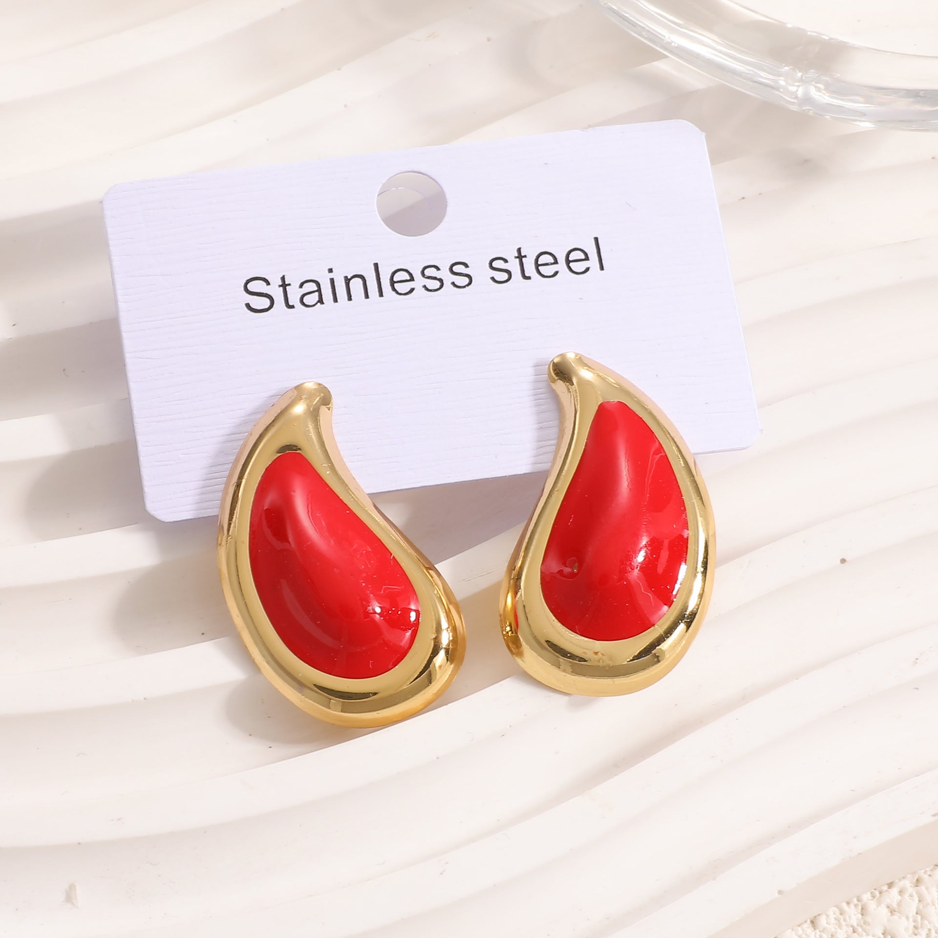 Damen Ohrstecker mit kunstvollem Wellenmuster Shop Nory
