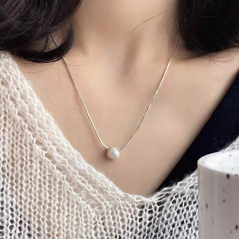 Damen Halskette mit zeitlosem Perlenanhänger und elegantem Silberminimalismus Shop Nory