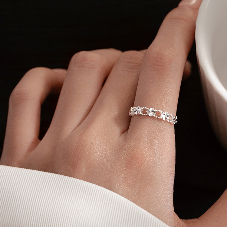 Damen Zierlicher Ring mit floralem Design und funkelnden Akzenten Shop Nory