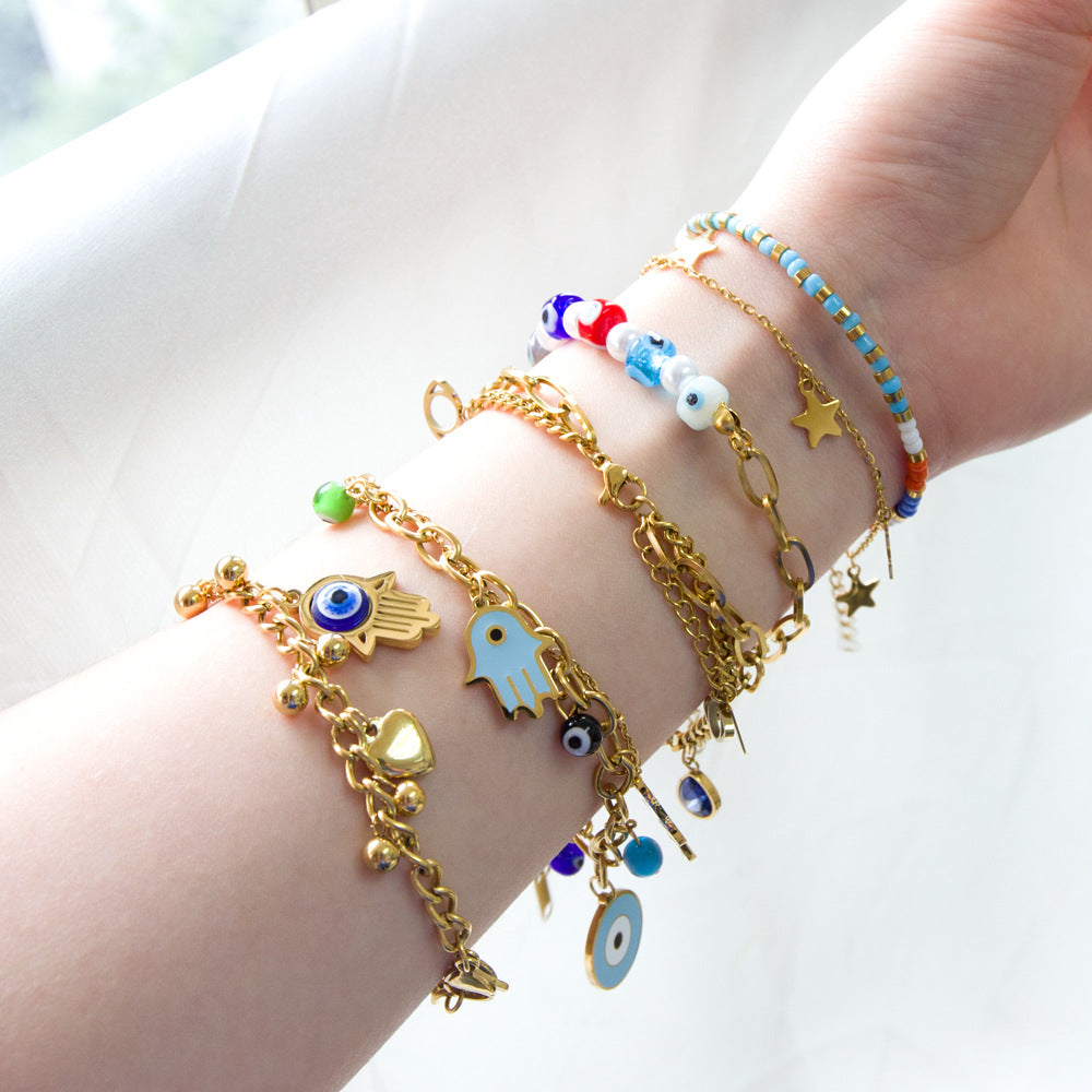 Damen Armband mit farbenfrohen Perlen und hochwertiger Edelstahl-Kette Shop Nory