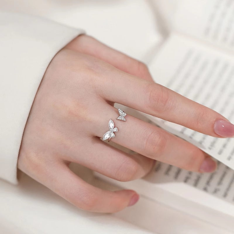 Damenring mit filigranen Schmetterlingsdesigns und funkelnden Zirkonia Shop Nory
