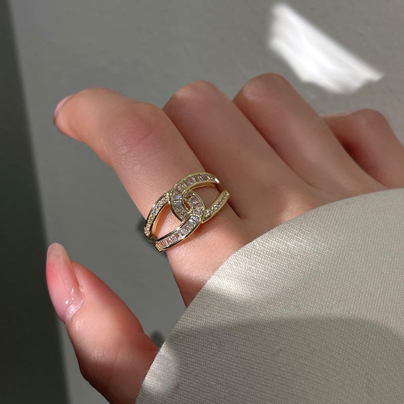 Damen Offener Ring mit kunstvollem Zirkonia-Besatz und glänzendem Goldfinish Shop Nory