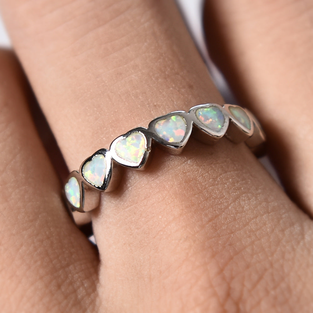 Damen Ring mit schillernden Opalsteinen und eleganter Edelstahlfassung Shop Nory