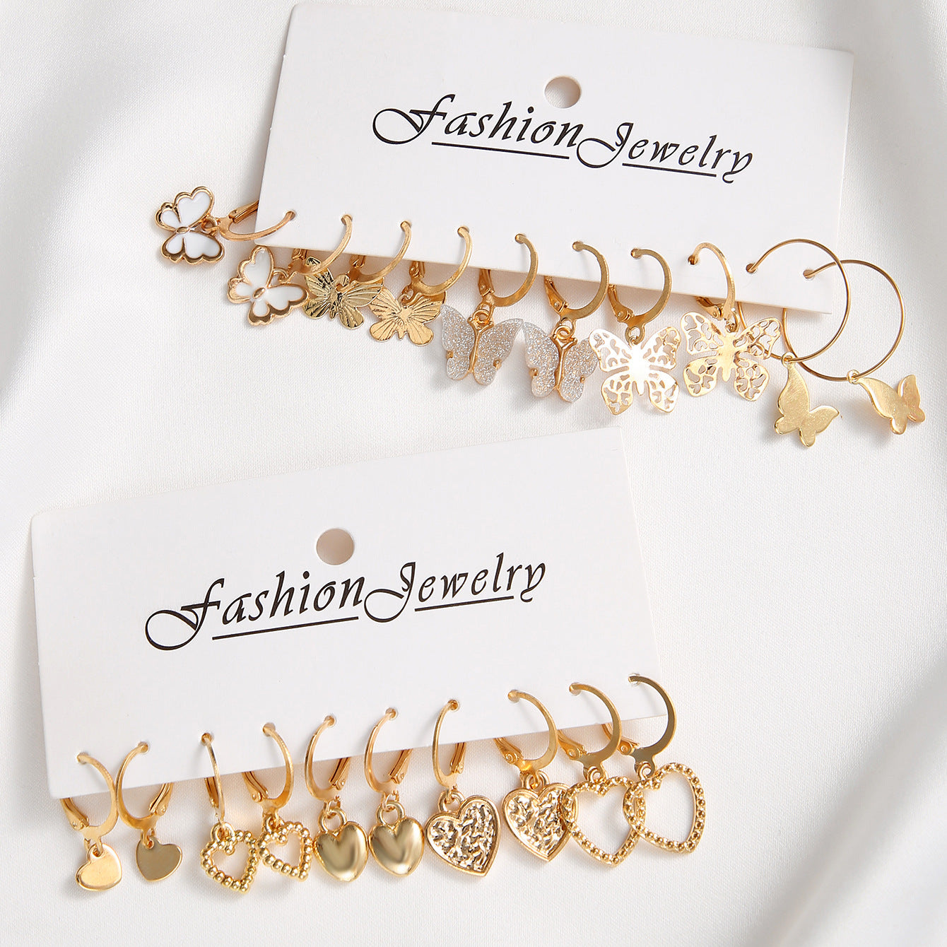 Damen Ohrstecker Set mit inspirierenden Herz- und Schmetterlingsanhängern Shop Nory
