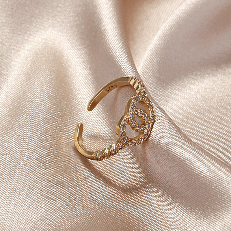 Damen Offener Ring mit funkelnden Zirkonia und elegantem Knoten-Design Shop Nory