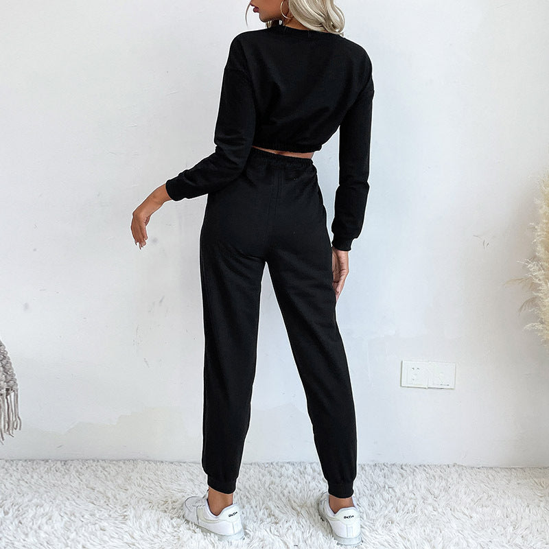 Damen Zweiteiliges Lounge-Set mit gedrehtem kurz geschnittenem Sweatshirt und hochtaillierter Jogginghose Shop Nory