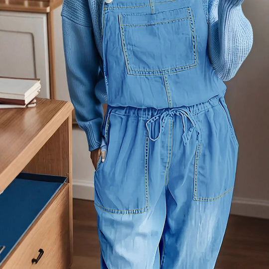 Damen Latzhose-Jumpsuit aus leichtem Denim mit Tunnelzugbund, aufgesetzten Taschen und umgeschlagenem Saum Shop Nory