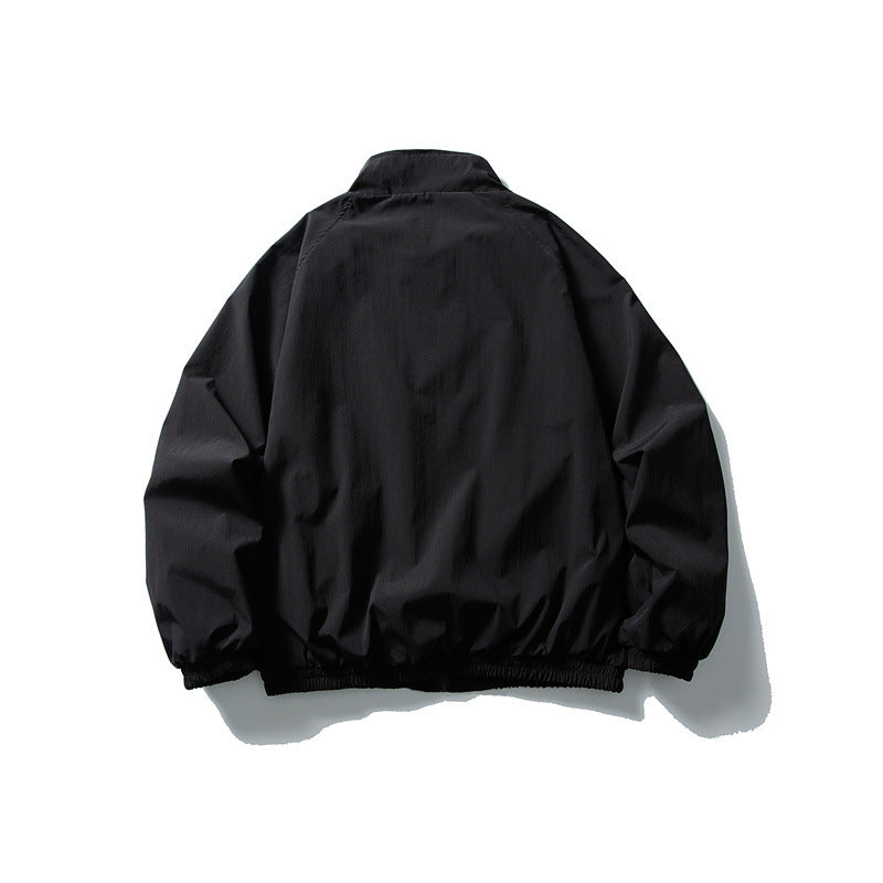Unisex Leichte wasserabweisende Windjacke mit Stehkragen, Raglanärmeln und elastischem Saum Shop Nory
