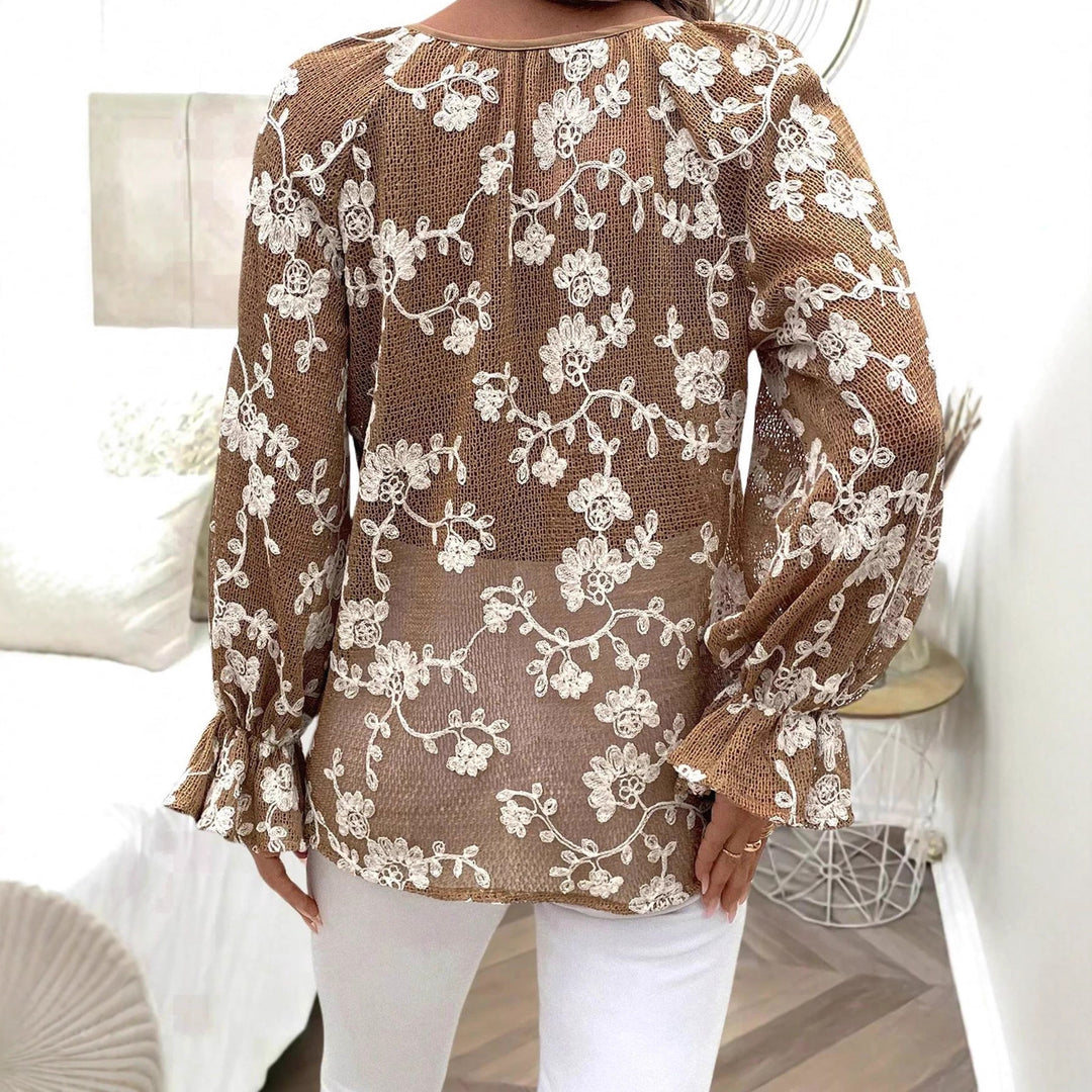 Damen V‑Neck Bluse mit floraler Stickerei, Perlenknopfleiste und Ballonärmeln Shop Nory