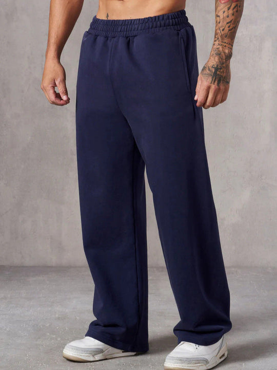 Herren Baggy Jogginghose mit elastischem Bund und seitlichen Taschen