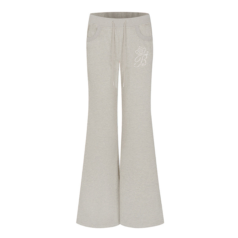 Damen Ausgestellte Loungehose mit hohem Komfortbund, Kordelzug und Strass‑Logo Shop Nory