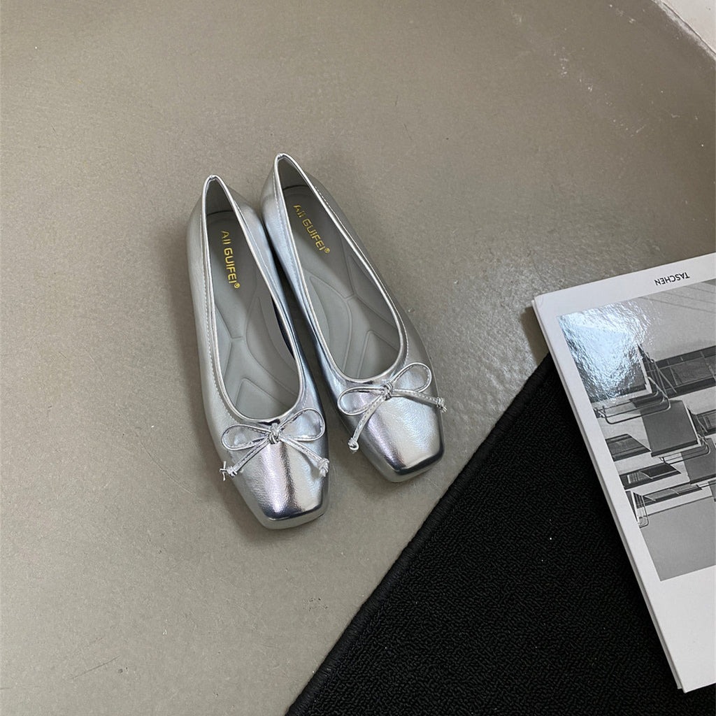 Damen klassisch geschnittene Ballerinas mit zierlichem Schleifenakzent und komfortabler Fußbettung