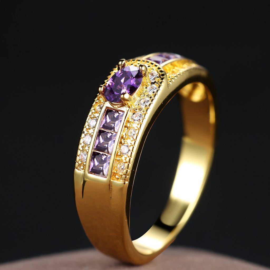 Damen Ring mit funkelndem lila Zirkonia und luxuriösem Golddesign Shop Nory