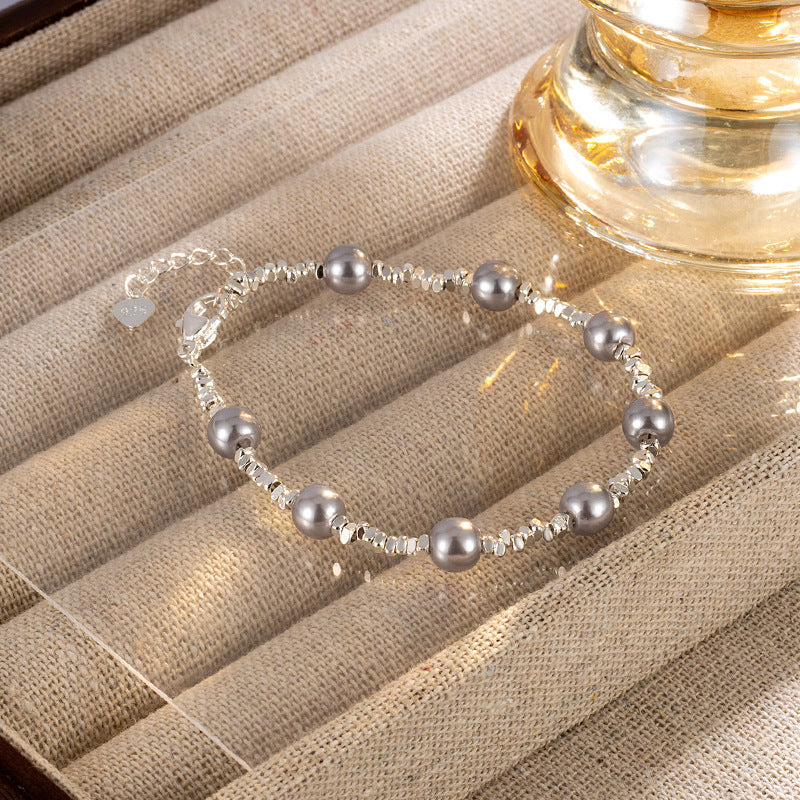 Damen Elegantes Perlenarmband mit funkelnden Akzenten Shop Nory
