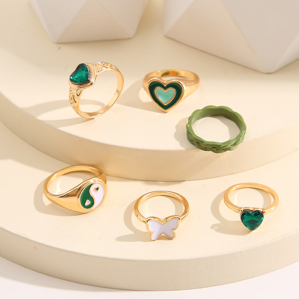 Damen modisches Mehrfach-Ringset mit bunten und symbolischen Designs Shop Nory