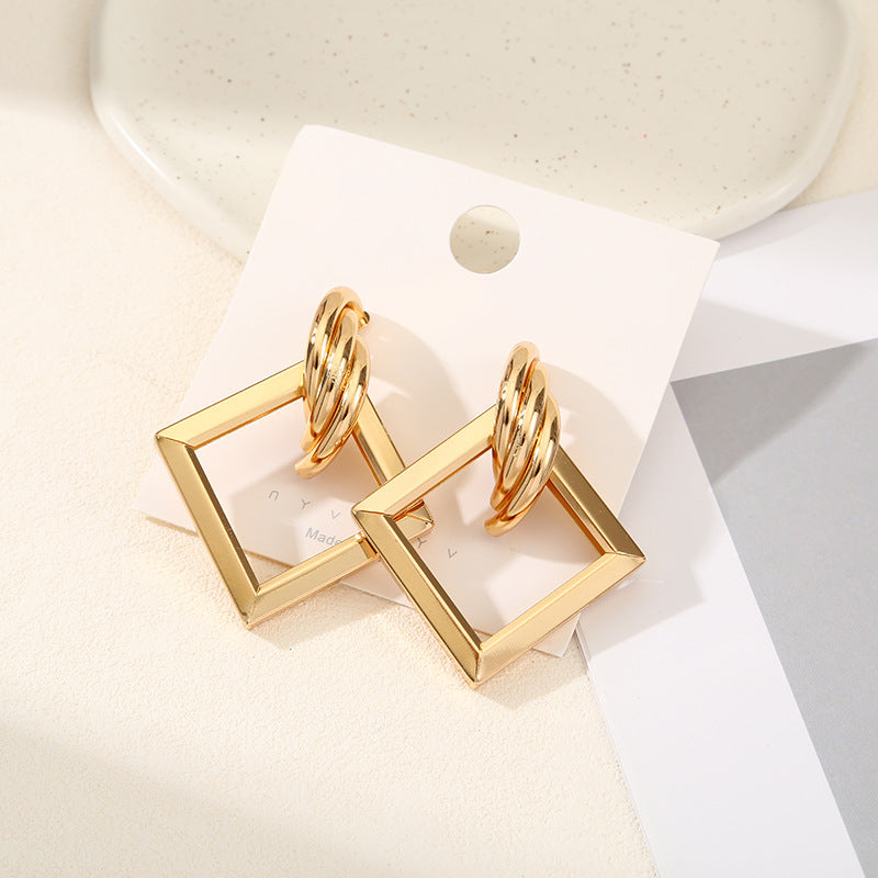 Damen Hängende Ohrringe mit quadratischem Design und glänzender Oberfläche Shop Nory