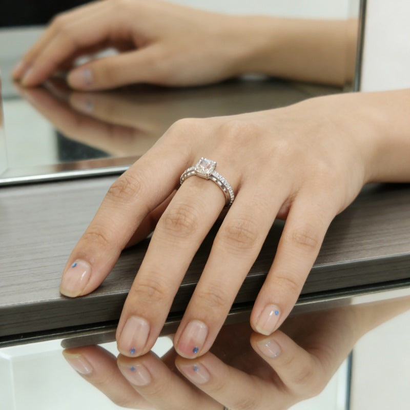 Damen Verlobungsring mit pinkem Zirkon und funkelnden Akzenten Shop Nory