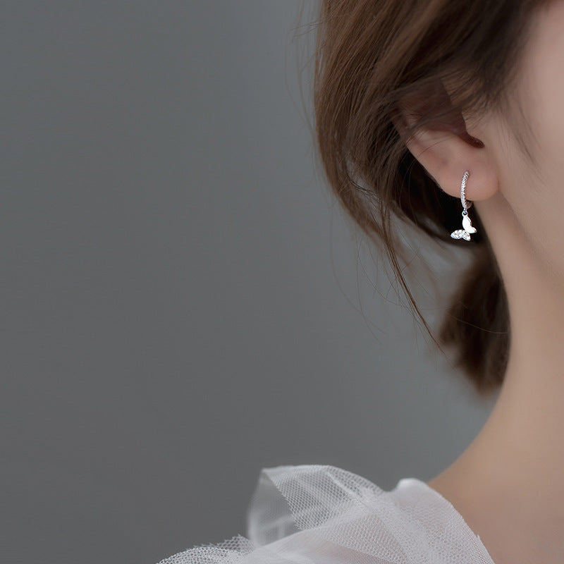 Damen Ohrhänger mit elegantem Schmetterlingsdesign und funkelnden Details Shop Nory
