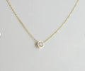 Damen Halskette mit funkelndem Zirkonia-Anhänger und feiner Goldkette Shop Nory