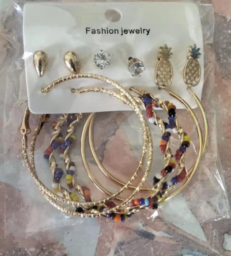 Damen Ohrringe Set mit elegantem Perlendesign und funkelnden Goldakzenten Shop Nory