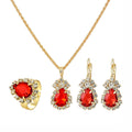 Damen Schmuckset mit funkelnden roten Steinen und eleganten goldenen Akzenten Shop Nory