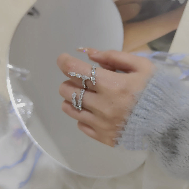 Damen Offener Ring mit filigranem Design und funkelnden Zirkonia Shop Nory