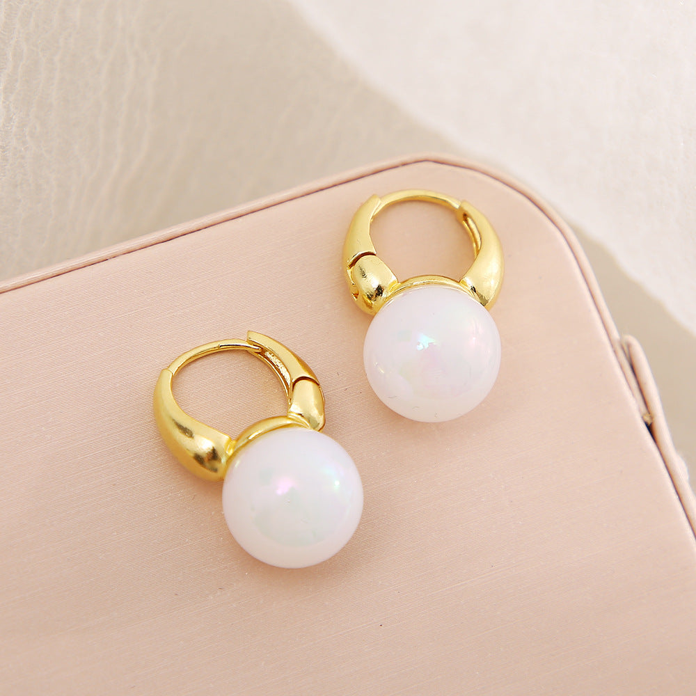 Damen Ohrstecker mit eleganter Perle und strahlenden Kristallen Shop Nory