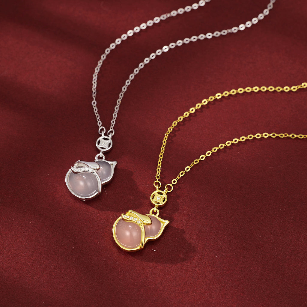 Damen elegante Halskette mit kunstvollem Blatt-Design und Perlenanhänger Shop Nory