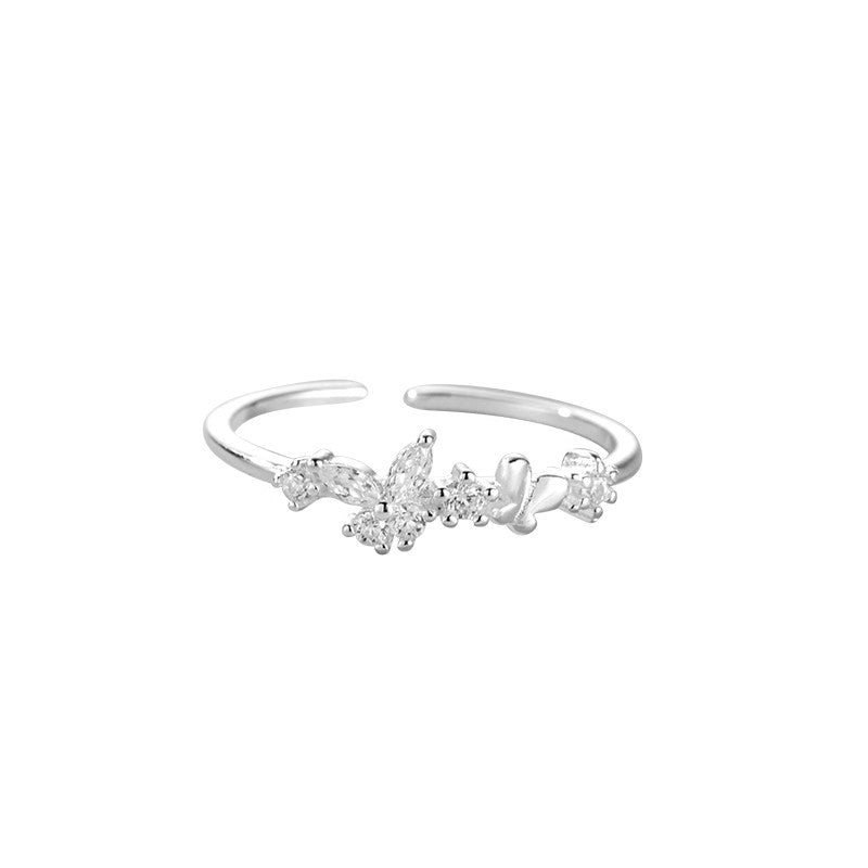 Damen eleganter Ring mit funkelnden Zirkonia und offenem Design Shop Nory