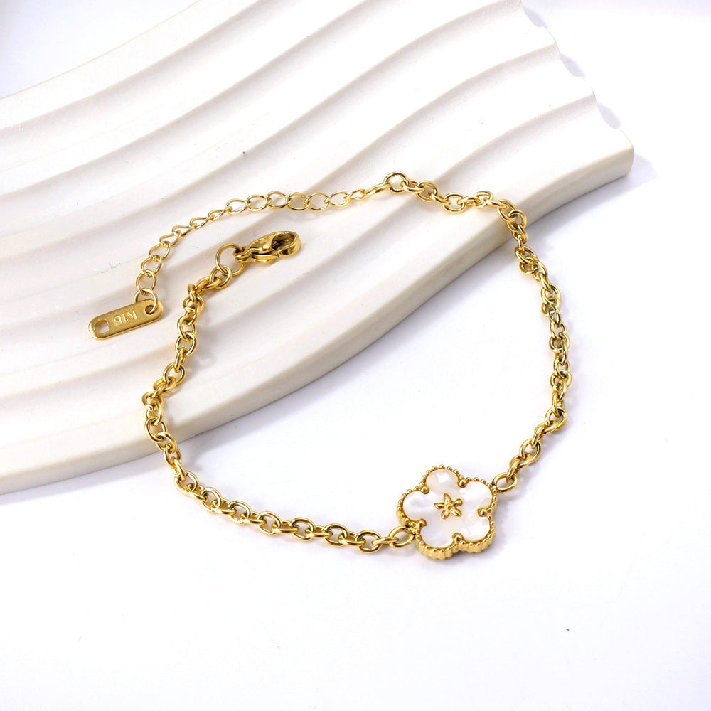 Damen Armband mit floralem Anhänger aus hochglanzpoliertem Edelstahl Shop Nory