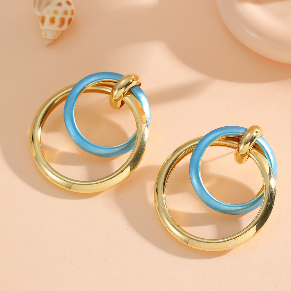 Damen Ohrringe mit elegantem, überlagertem Ringdesign Shop Nory