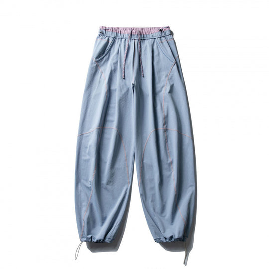 Unisex Locker geschnittene Tech-Jogginghose mit elastischem Bund, markanten Flatlock-Nähten und Kordelzug Shop Nory
