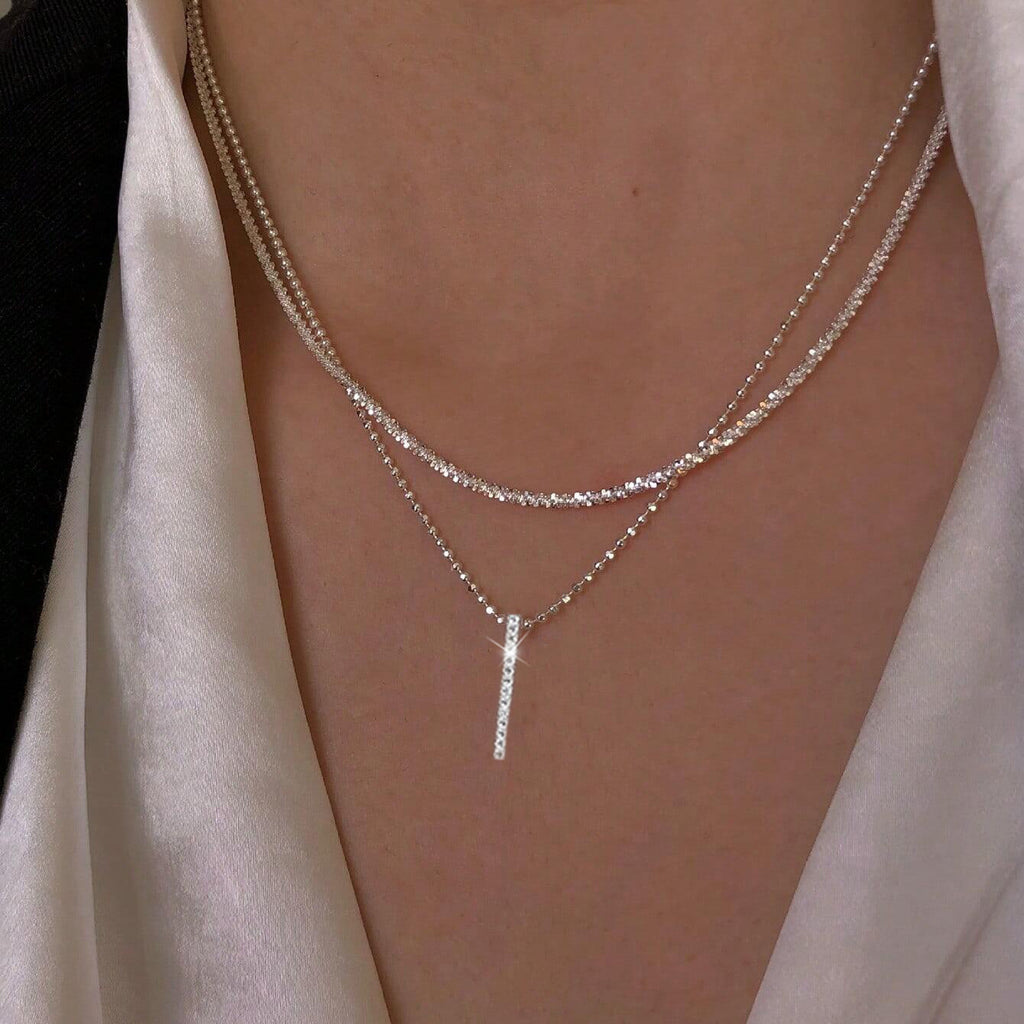 Damen Halskette mit doppeltem Kettendesign und funkelndem Anhänger Shop Nory