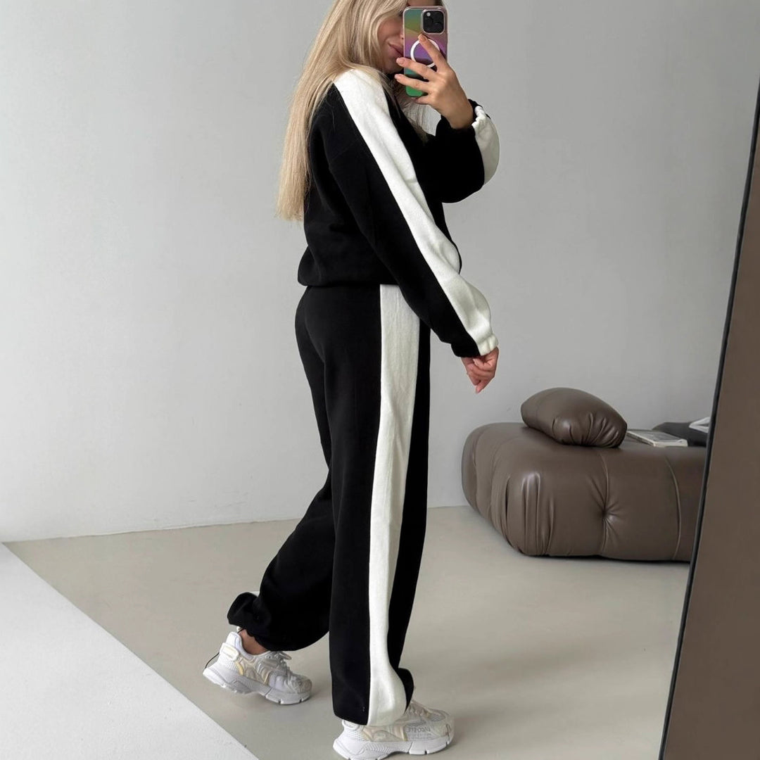 Damen sportlich-elegantes Fleece-Trainingsset mit kurzem Stehkragen-Zip, elastischem Bund und seitlichen Kontrastbahnen Shop Nory