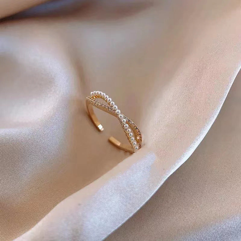 Damen eleganter Perlenarmreif mit funkelnden Zirkonias Shop Nory