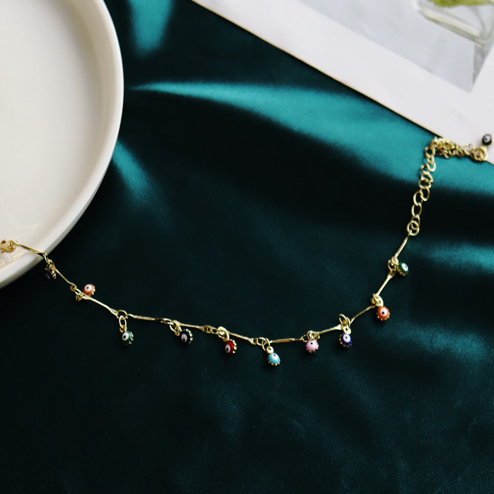 Damen Fußkettchen mit bunten Augen-Anhängern und eleganter Gliederkette Shop Nory