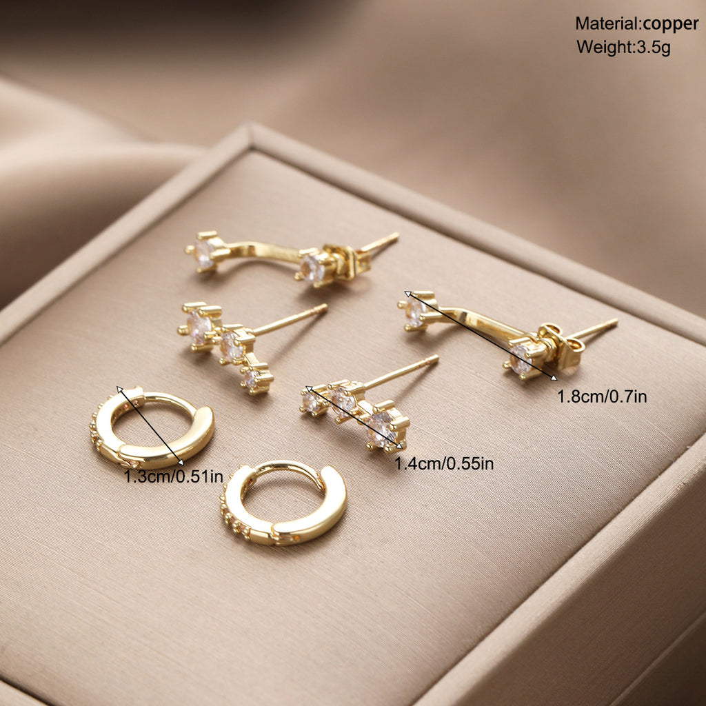 Damen Ohrstecker-Set mit eleganten Spiralen und funkelnden Akzenten Shop Nory