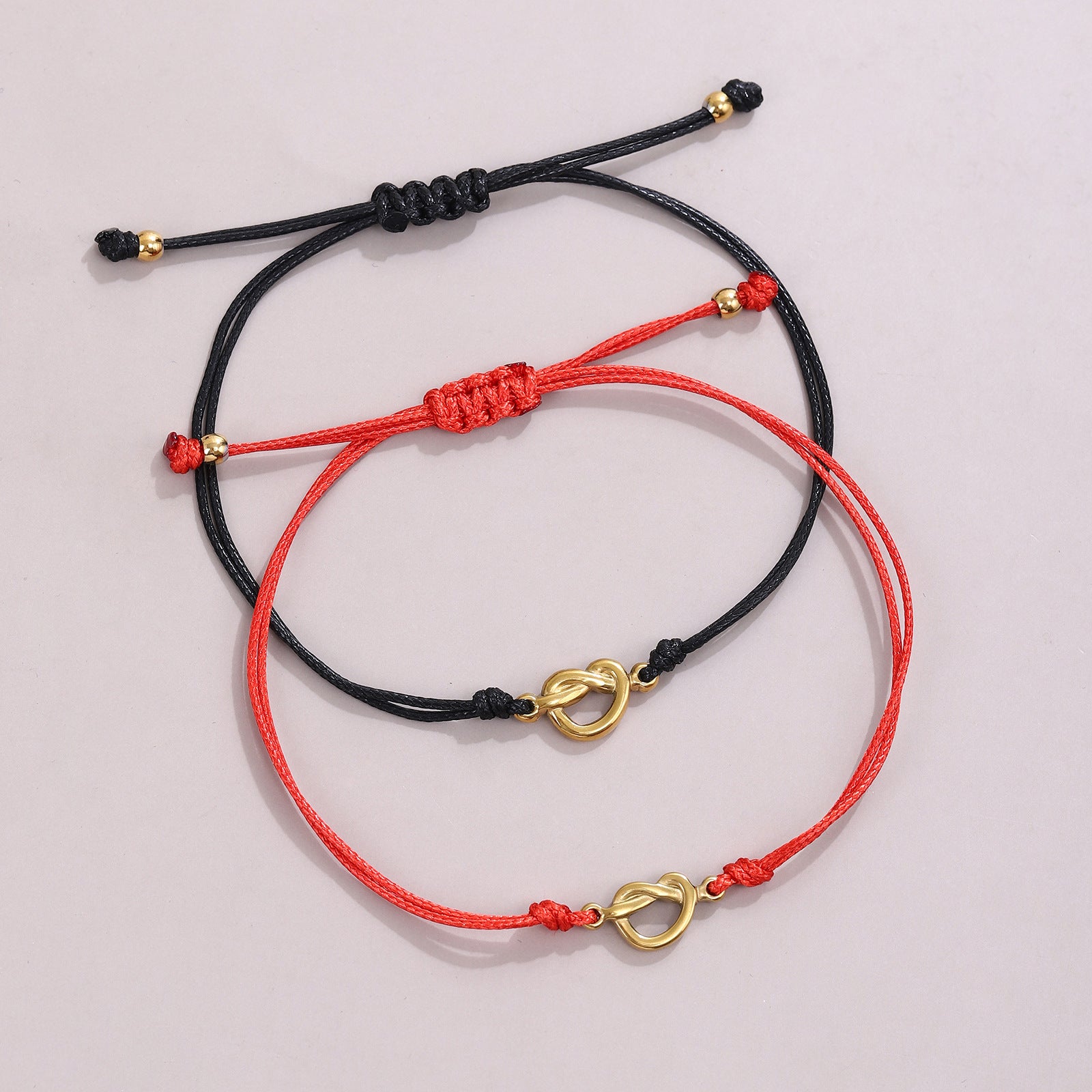 Damenarmband mit verstellbarem Knoten und Herzverschluss Shop Nory