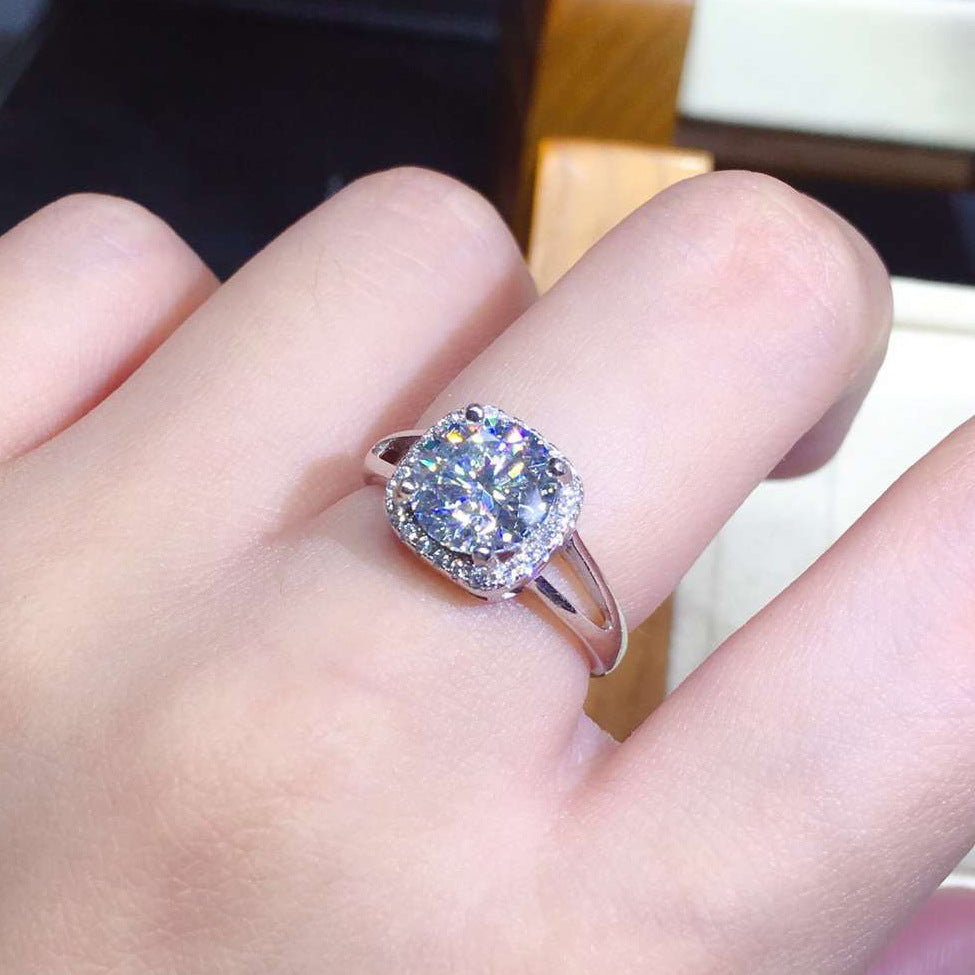 Damen eleganter Schmuckring mit quadratischem Hauptstein und funkelndem Zirkonia-Rahmen Shop Nory