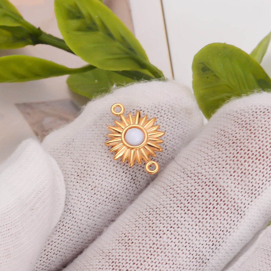 Damen Sonnenanhänger mit schwarzem Stein und goldenem Finish Shop Nory
