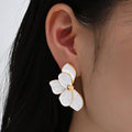 Damen Ohrringe im floralen Design mit elegantem Goldrand Shop Nory